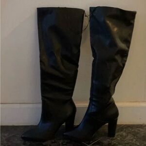 Express Woman’s Black Knee High Black Boots NWT.